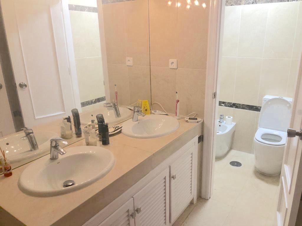 Bathroom with twin sinks, bidet and toilet