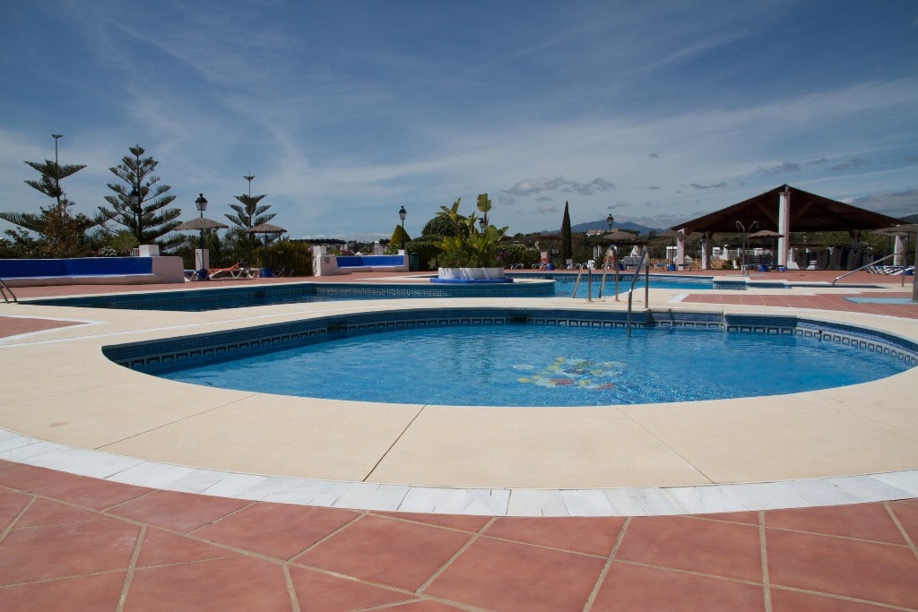 Club Sierra pool with sun loungers and mountain views